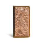 Brown leather bifold wallet with tooled floral design, shown standing upright.