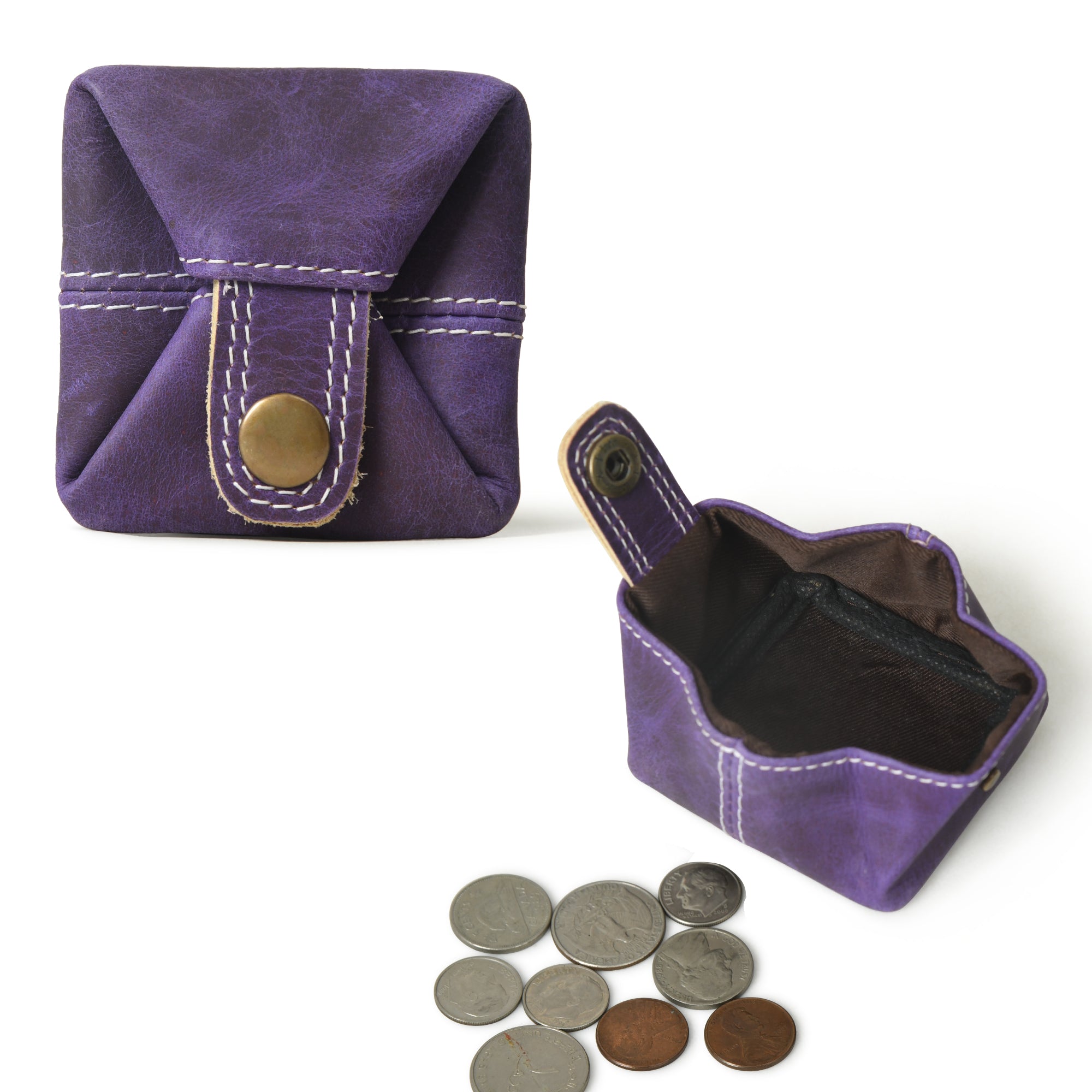 Purple leather coin pouch with white stitching shown both closed and open with coins scattered nearby.