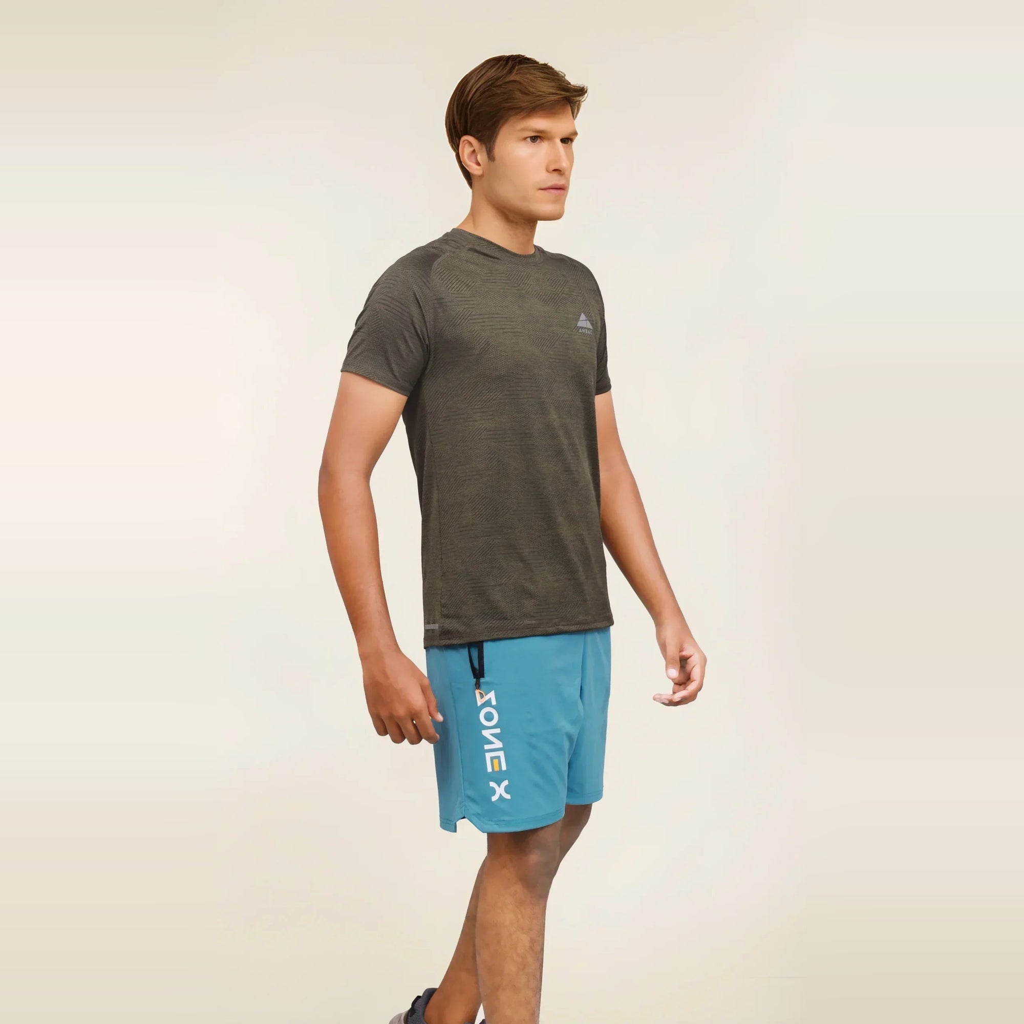 Man wearing a breathable, short sleeve, dry fit crew neck t-shirt.