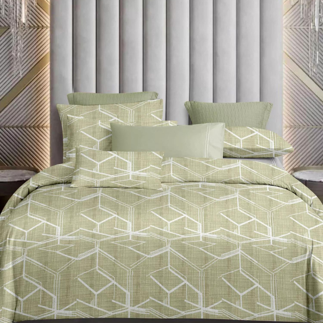 Sage green king-size bedsheets with a modern white hexagonal geometric pattern, displayed on a bed.