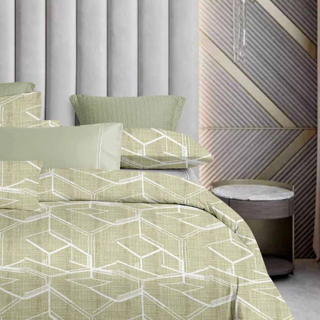 Sage green bedsheets with a modern white hexagonal geometric pattern adorn a king-size bed.