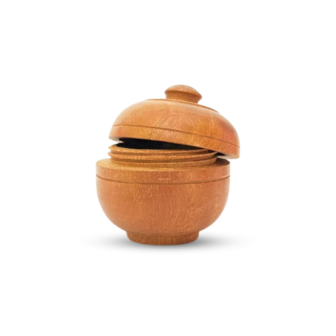 Open wooden jar for natural solid body wax perfumes, perfect for meditation.