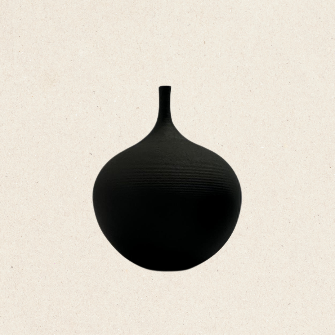 Black ceramic vase with a rustic finish, round body, and narrow neck. Adds a touch of rustic charm to any decor.