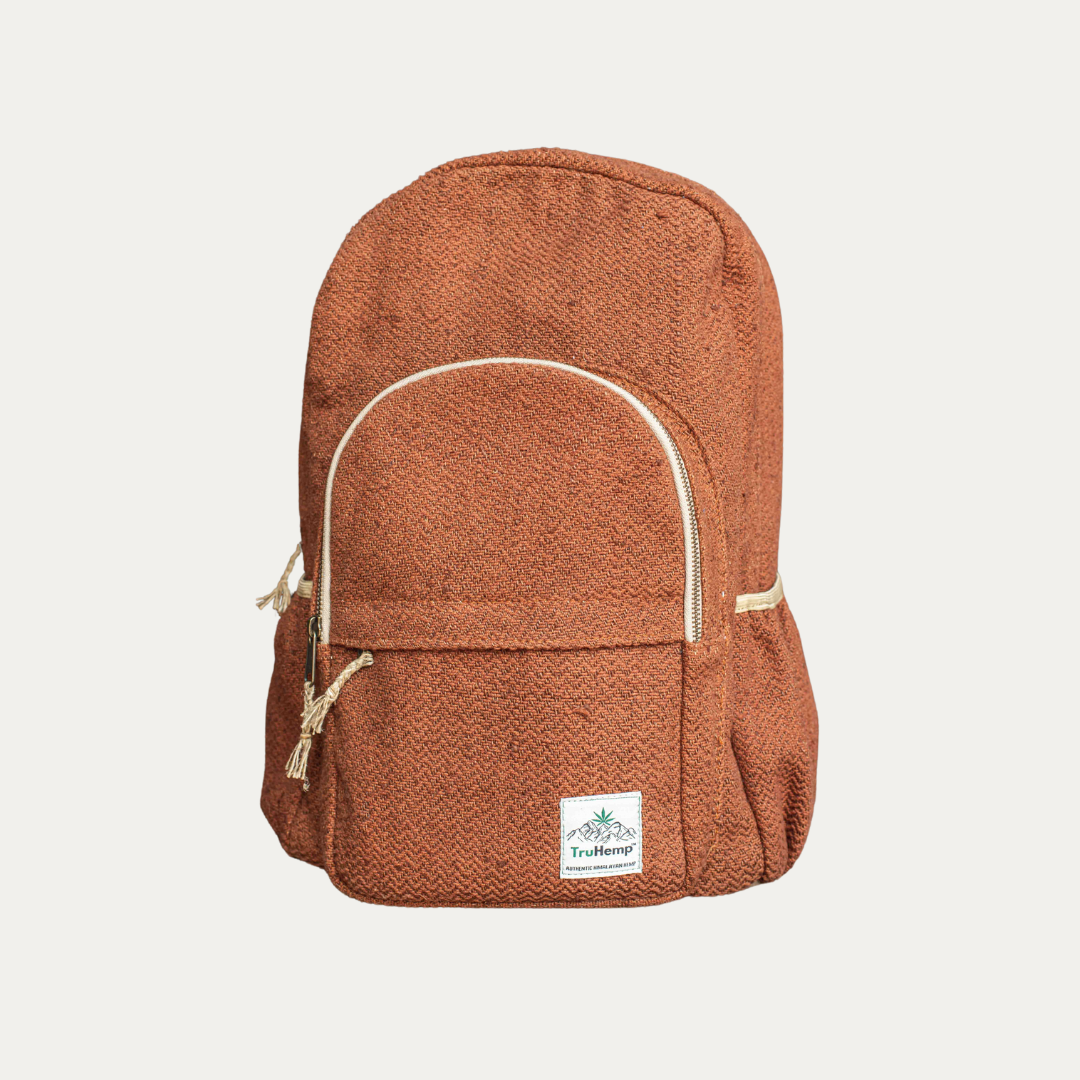 Stylish and eco-friendly, this burnt orange hemp backpack features a spacious main compartment, front pocket, and adjustable straps for comfortable carrying.