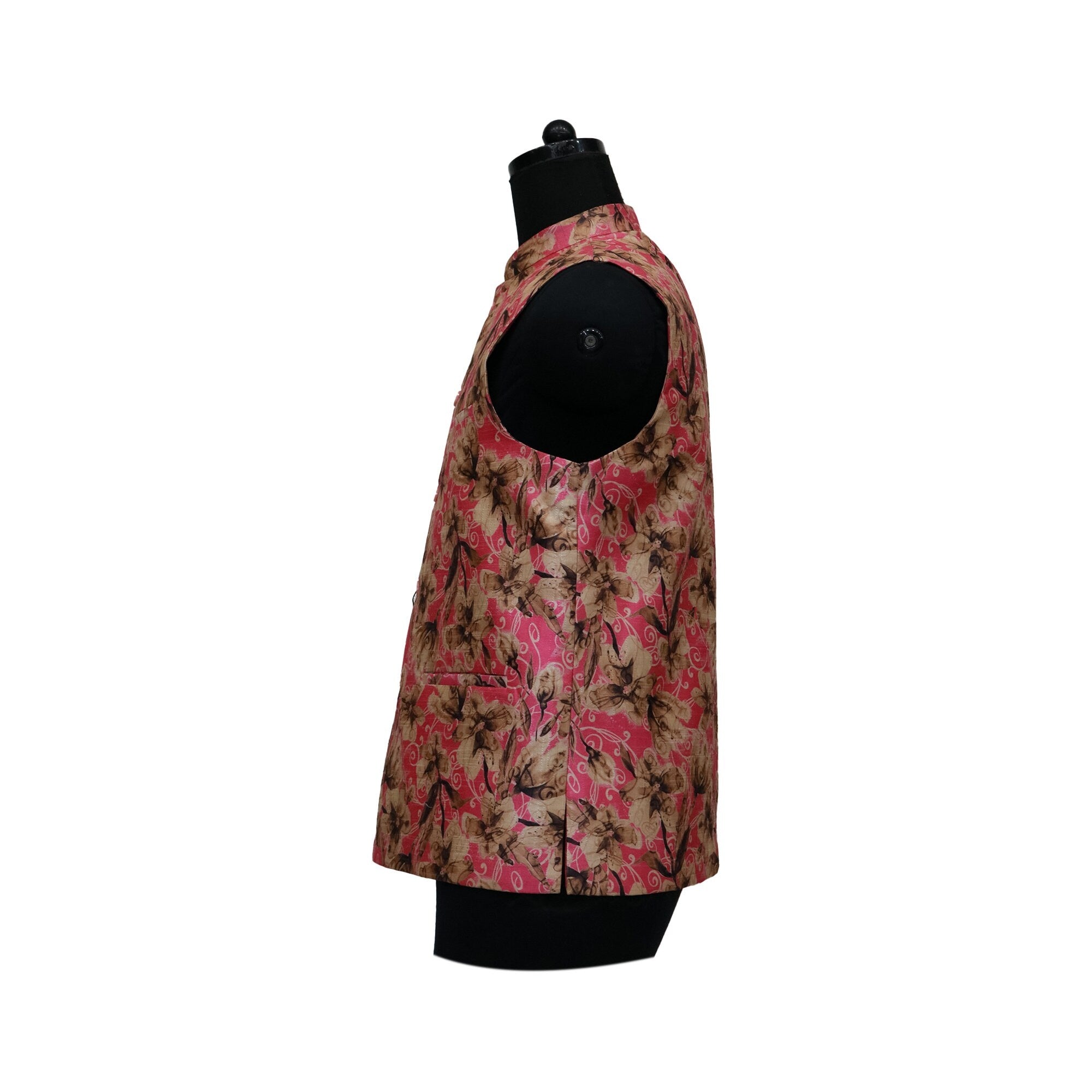 A side view of a men's pink floral Nehru jacket on a mannequin, showcasing its intricate design and fit.