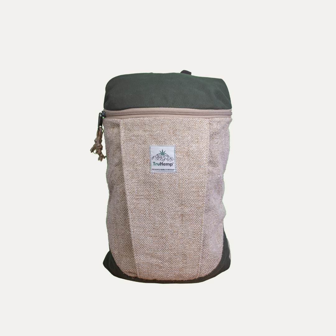 Handcrafted hemp backpack with a natural beige tone and green accents. This eco-friendly backpack is lined with pure cotton for durability.