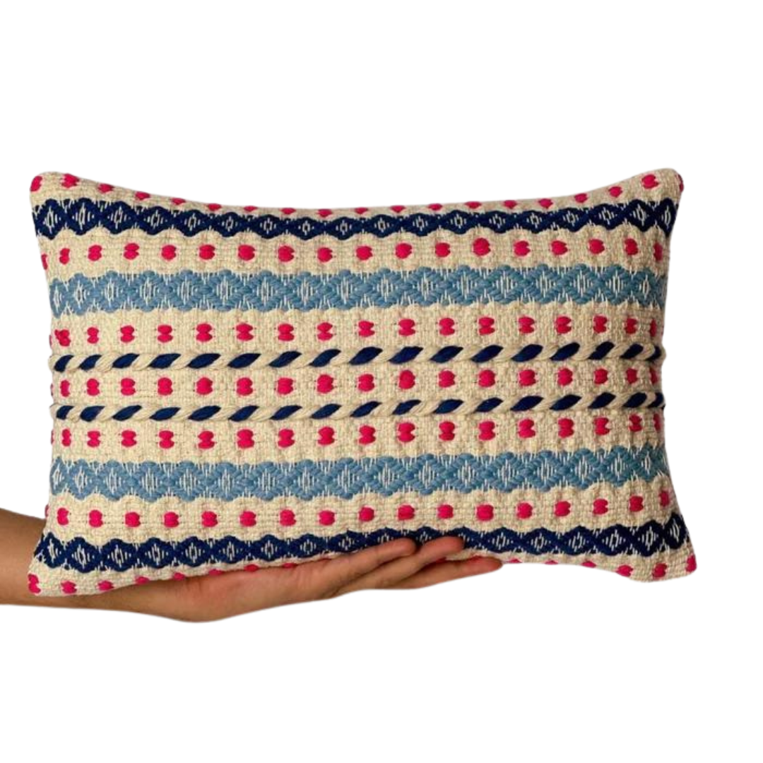 Rectangular Trellis Cotton Cushion Cover with a colorful African tribal art-inspired pattern in pink, blue, and cream.