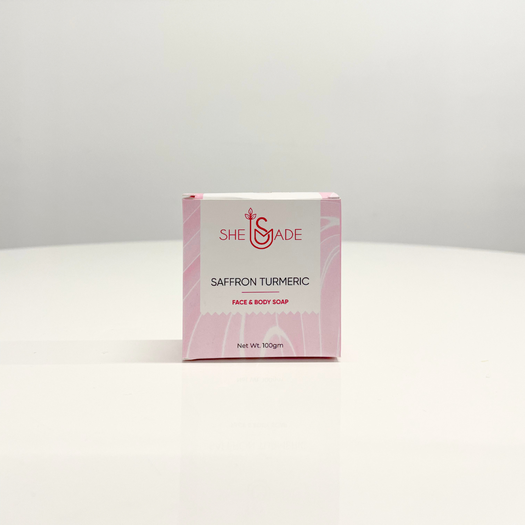 SheSmade Saffron Turmeric handcrafted soap bar in pink packaging.