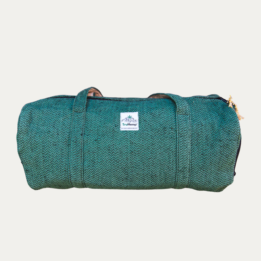 A durable, green hemp duffle bag with a separate shoe pocket, perfect for eco-conscious travelers.