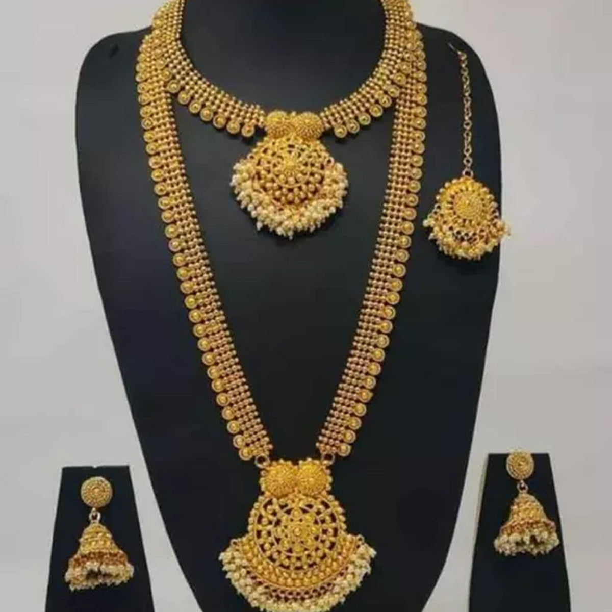 Luxurious Gold-Plated South Indian Bridal Jewelry Set - Necklace, Long Chain, Earrings, and Tikka, Traditional Indian Wedding Jewelry (Set of 2)