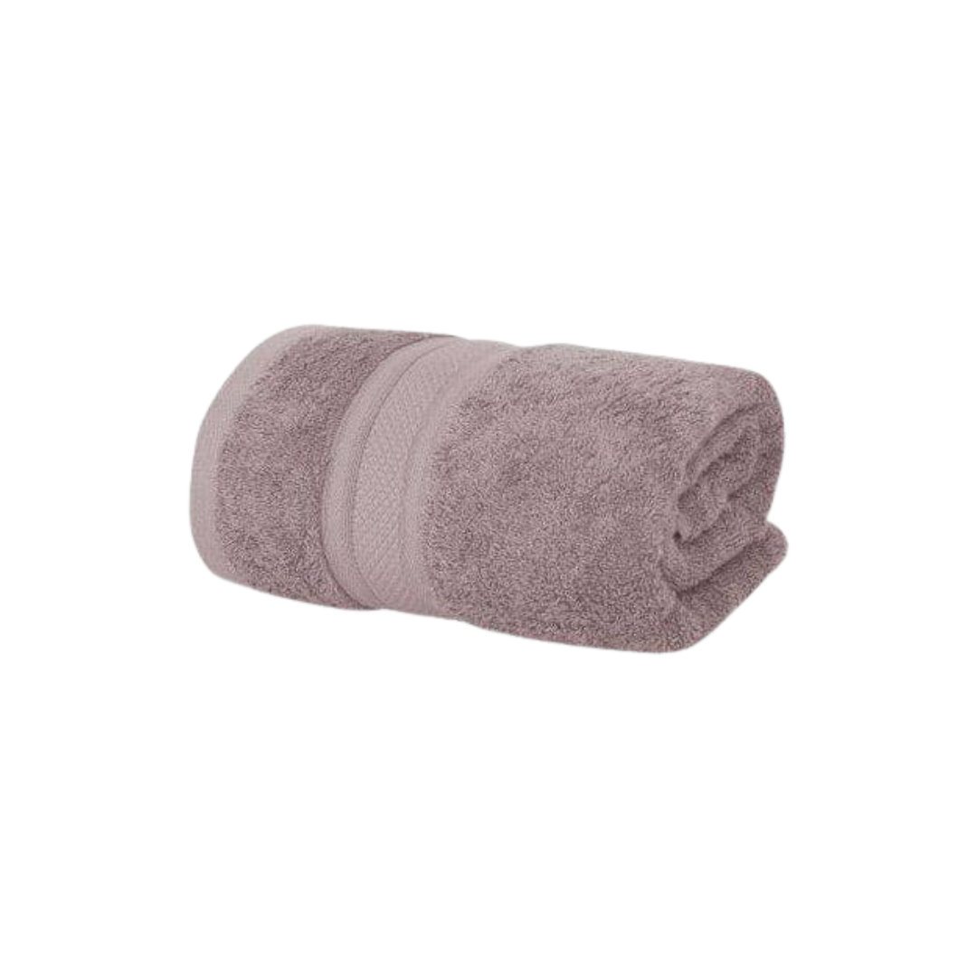 A plush, mauve-colored Ultra-Soft Bamboo Cotton Bath Towel, rolled and ready to provide luxurious comfort and absorbency.