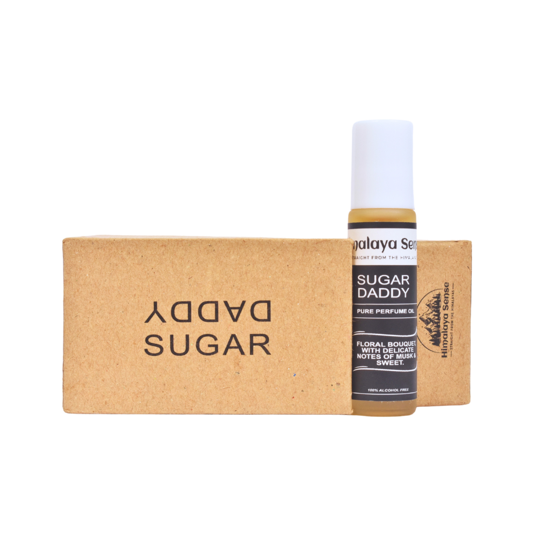 "Sugar Daddy" natural perfume roll-on by Himalaya Sense. This floral perfume oil features delicate notes of musk and sweet. Alcohol-free.