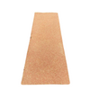 An eco-friendly natural cork rubber yoga mat in a natural tan color.