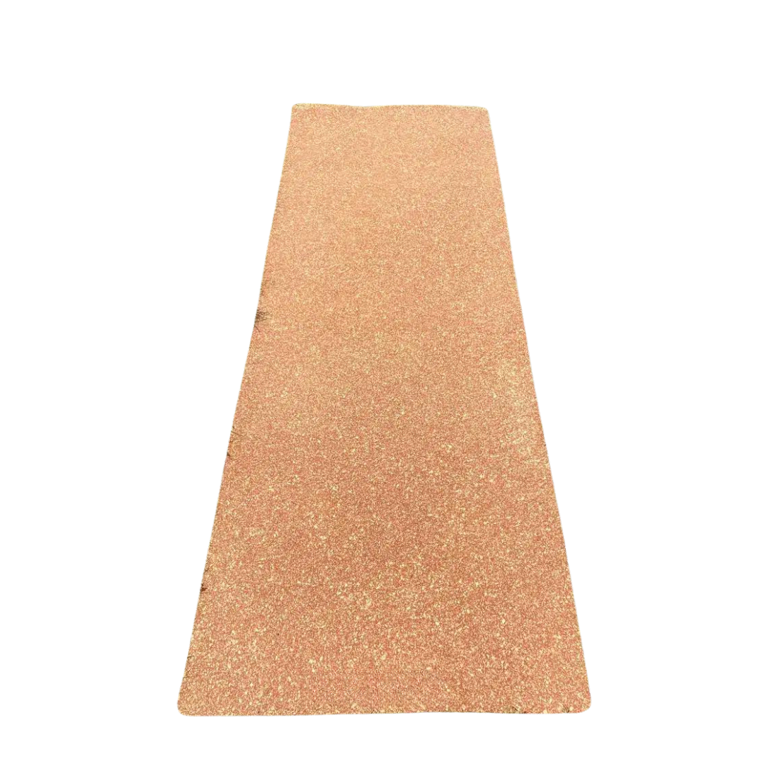 An eco-friendly natural cork rubber yoga mat in a natural tan color.