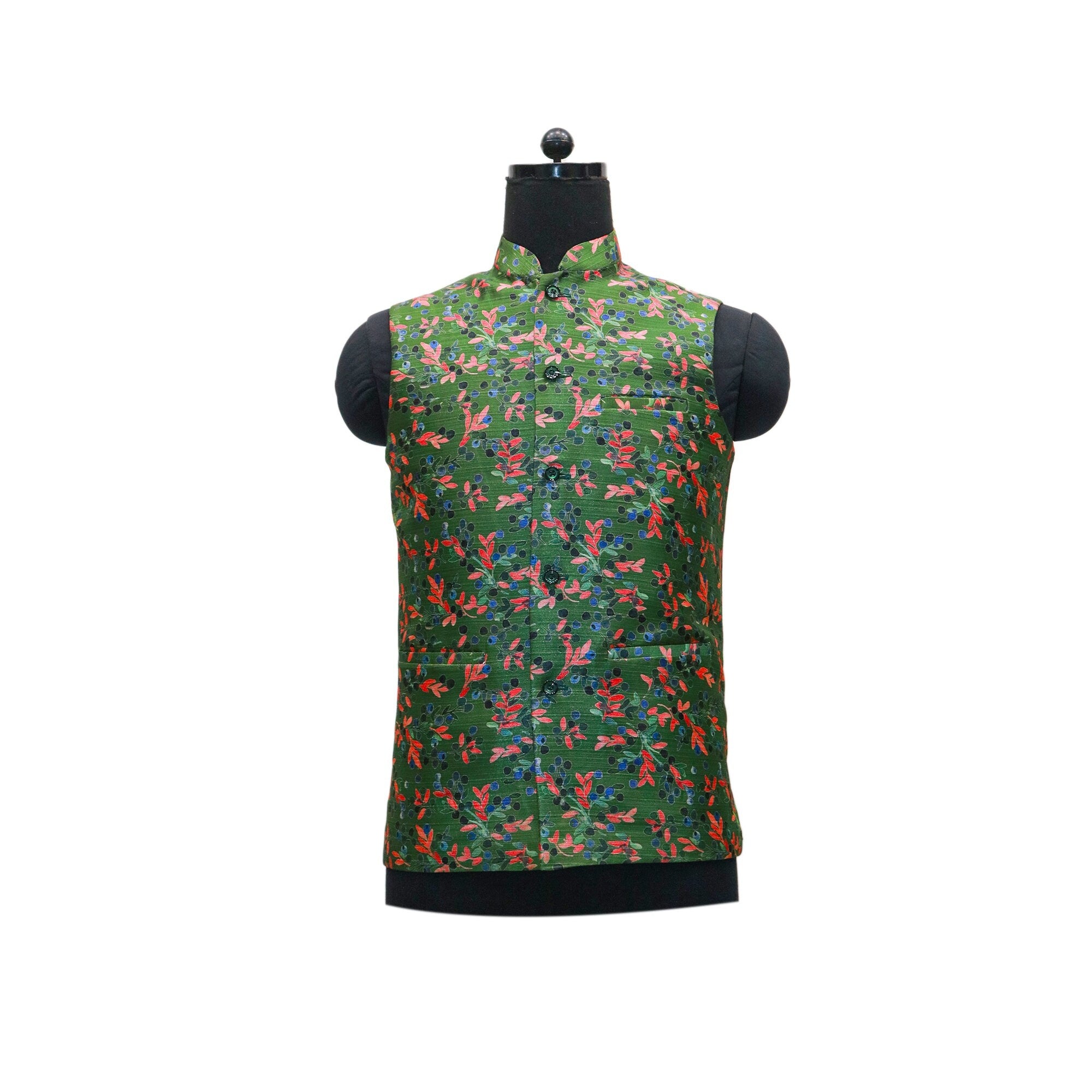 A green men's Nehru jacket with a red and blue floral pattern on a mannequin. Handmade vintage Indian ethnic wear, perfect for parties or as a gift.