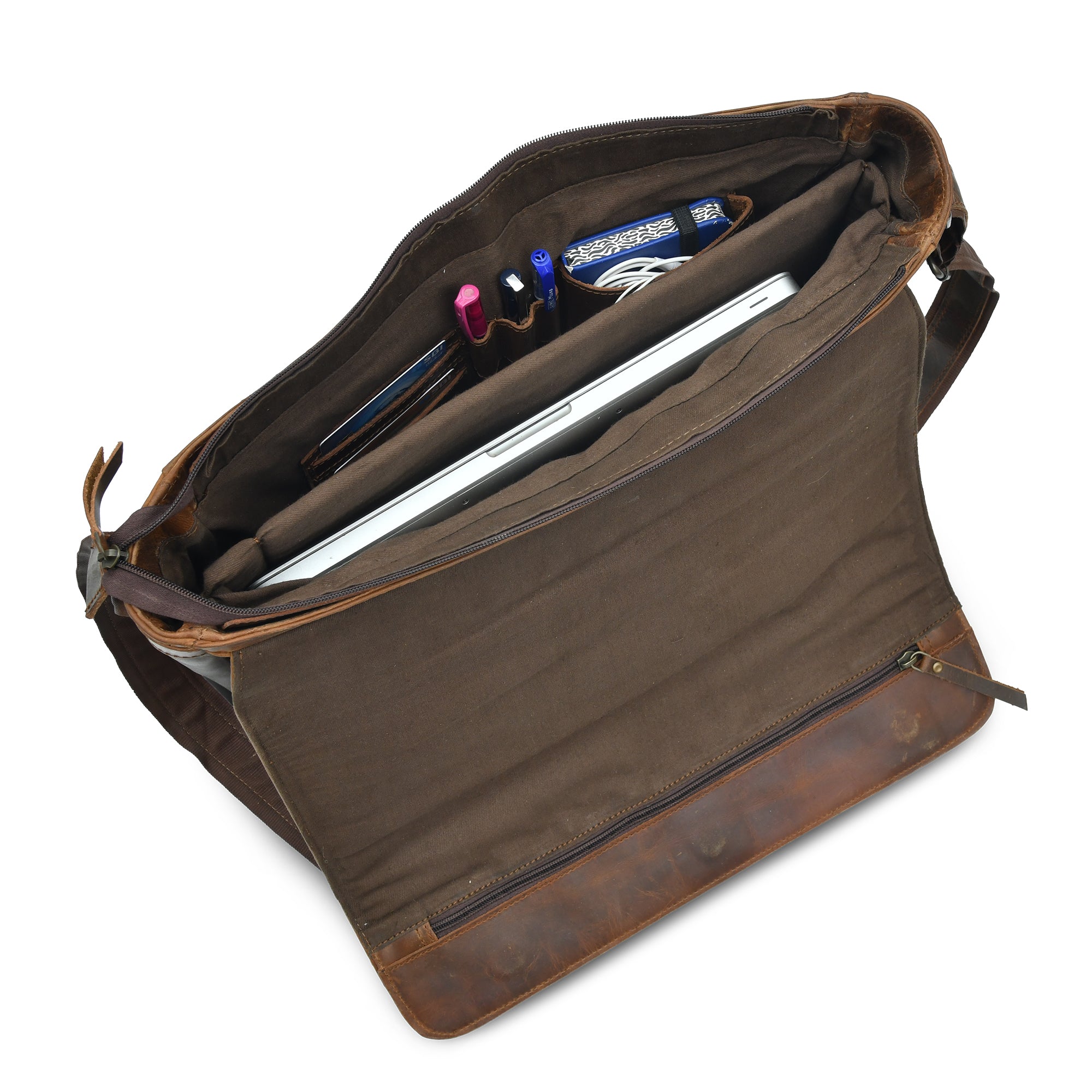 Open top grain leather messenger bag showing inner lining and storage compartments, including a laptop sleeve, pen holders, and pockets.