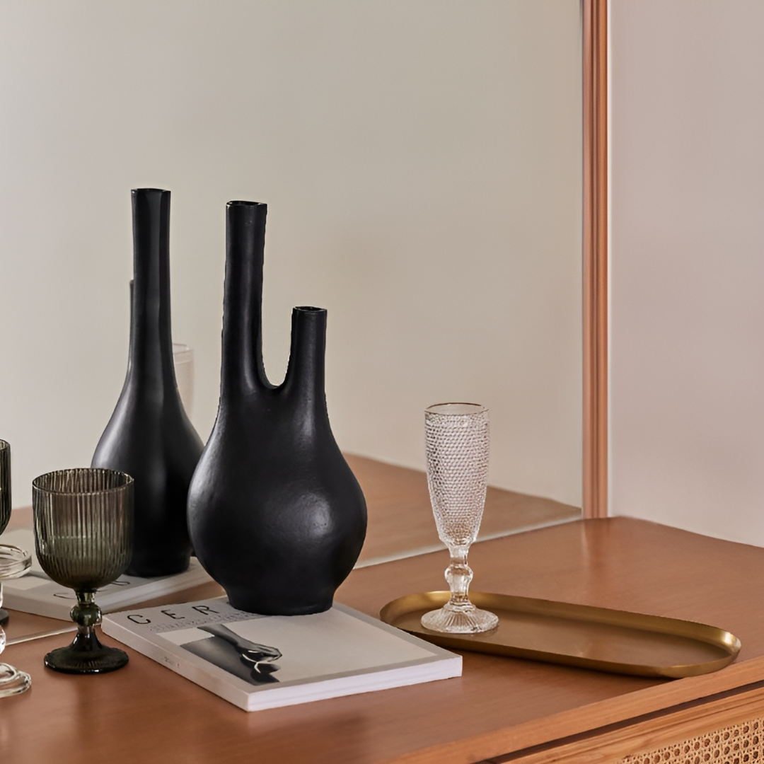 Matte black, three-neck vase with a modern, anti-slip design. Adds a touch of elegance to any setting.