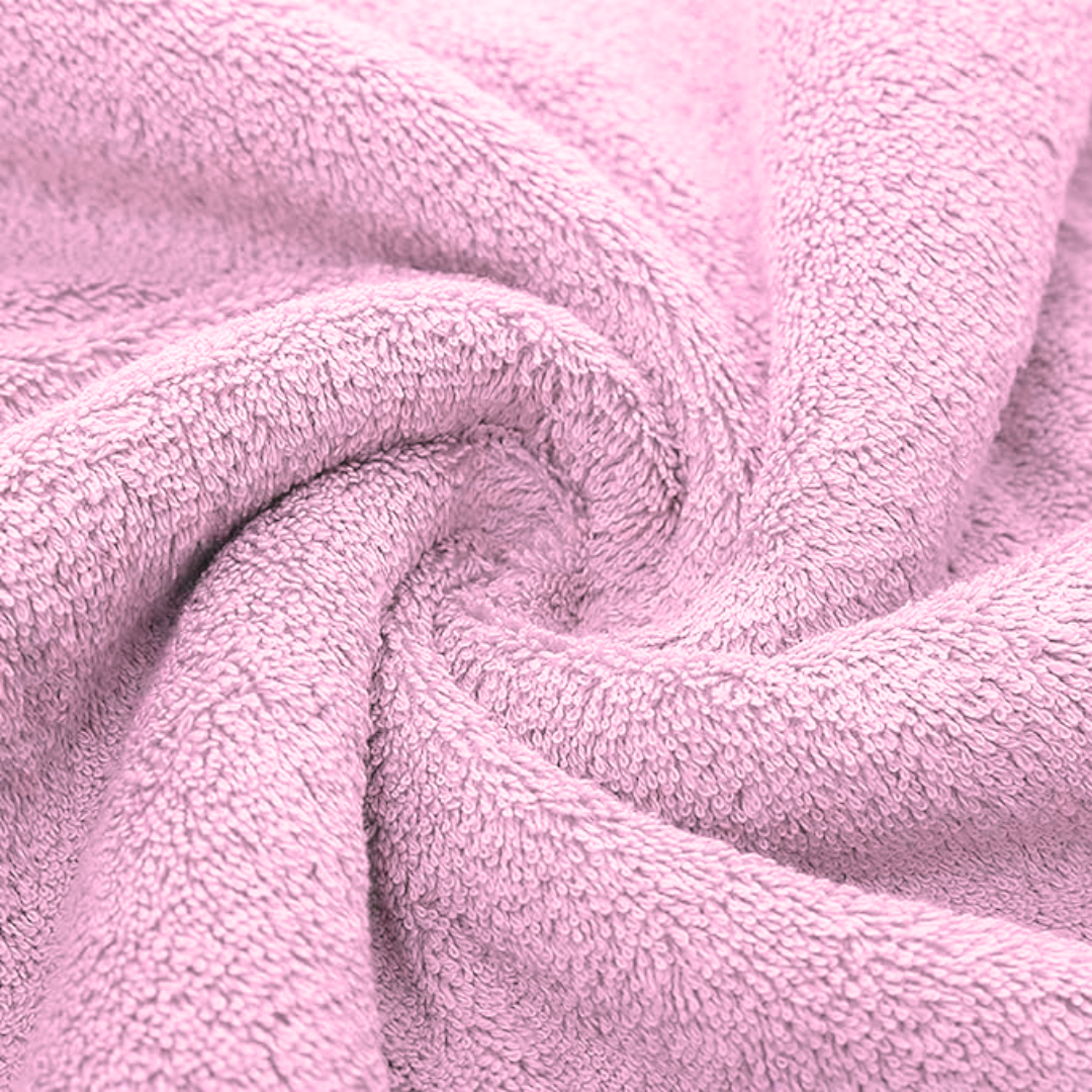 Soft, plush, pink bamboo cotton bath towel. Luxuriously soft and absorbent for a spa-like experience.