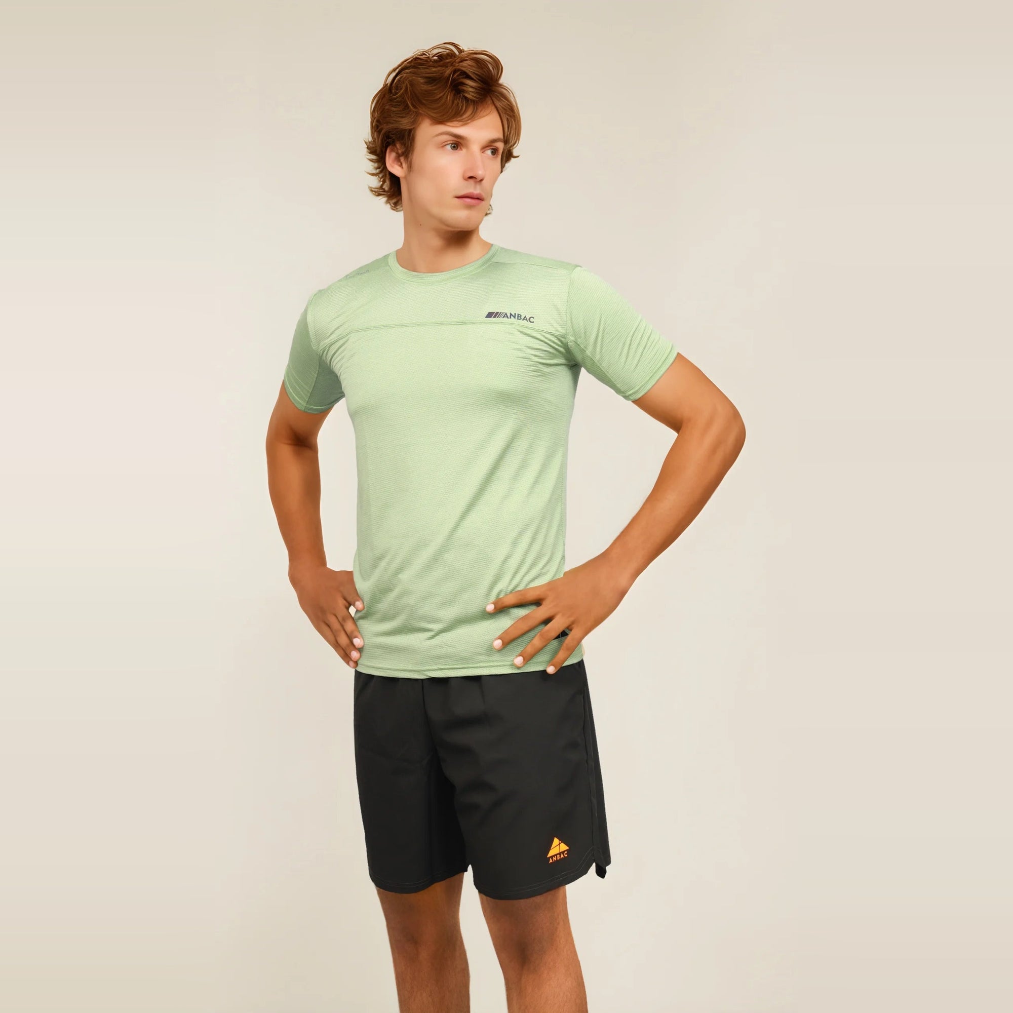 Man in a slim-fit, light green, short sleeve T-shirt. Perfect for a casual, comfortable look.