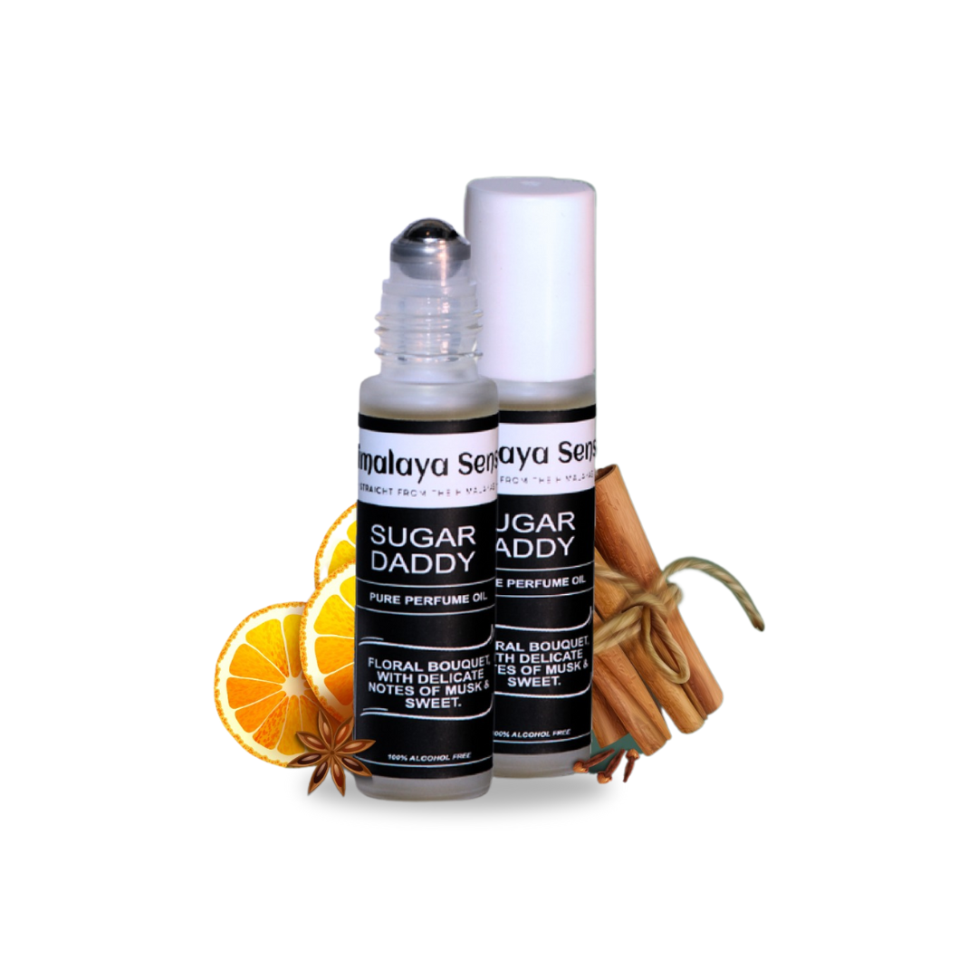 Two "Sugar Daddy" natural perfume roll-ons for women. This floral bouquet perfume features delicate notes of musk and sweet.