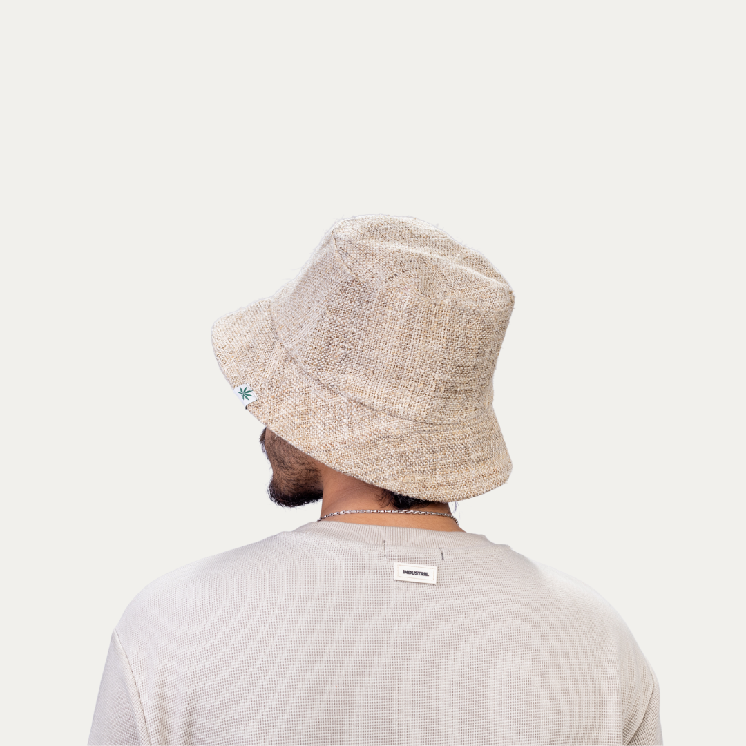 Man wearing a stylish, breathable hemp bucket hat with UV protection. Perfect for sunny days.