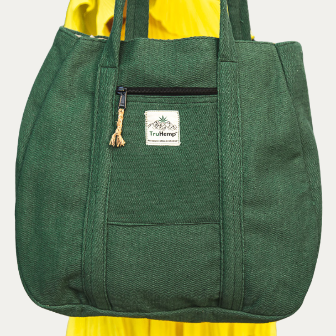 Stylish green Himalayan hemp tote bag with zippered pocket, perfect for eco-conscious women.