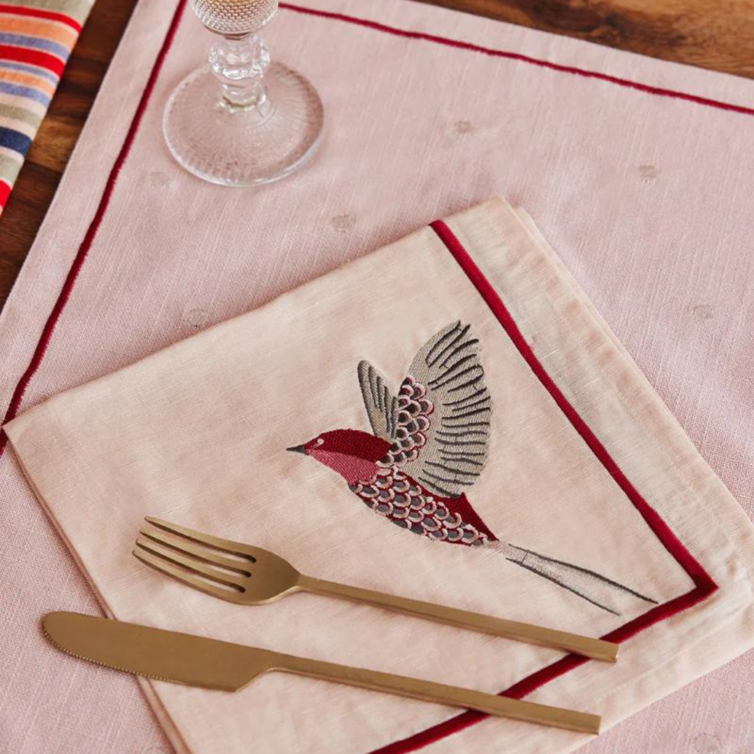 Scarlet French linen table runner and placemat set with embroidered bird design. Set includes 6 placemats and 6 napkins.