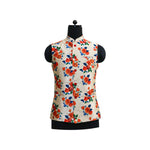 A cream men's vest with a colorful floral pattern on a mannequin. Perfect for ethnic parties or as a unique gift.