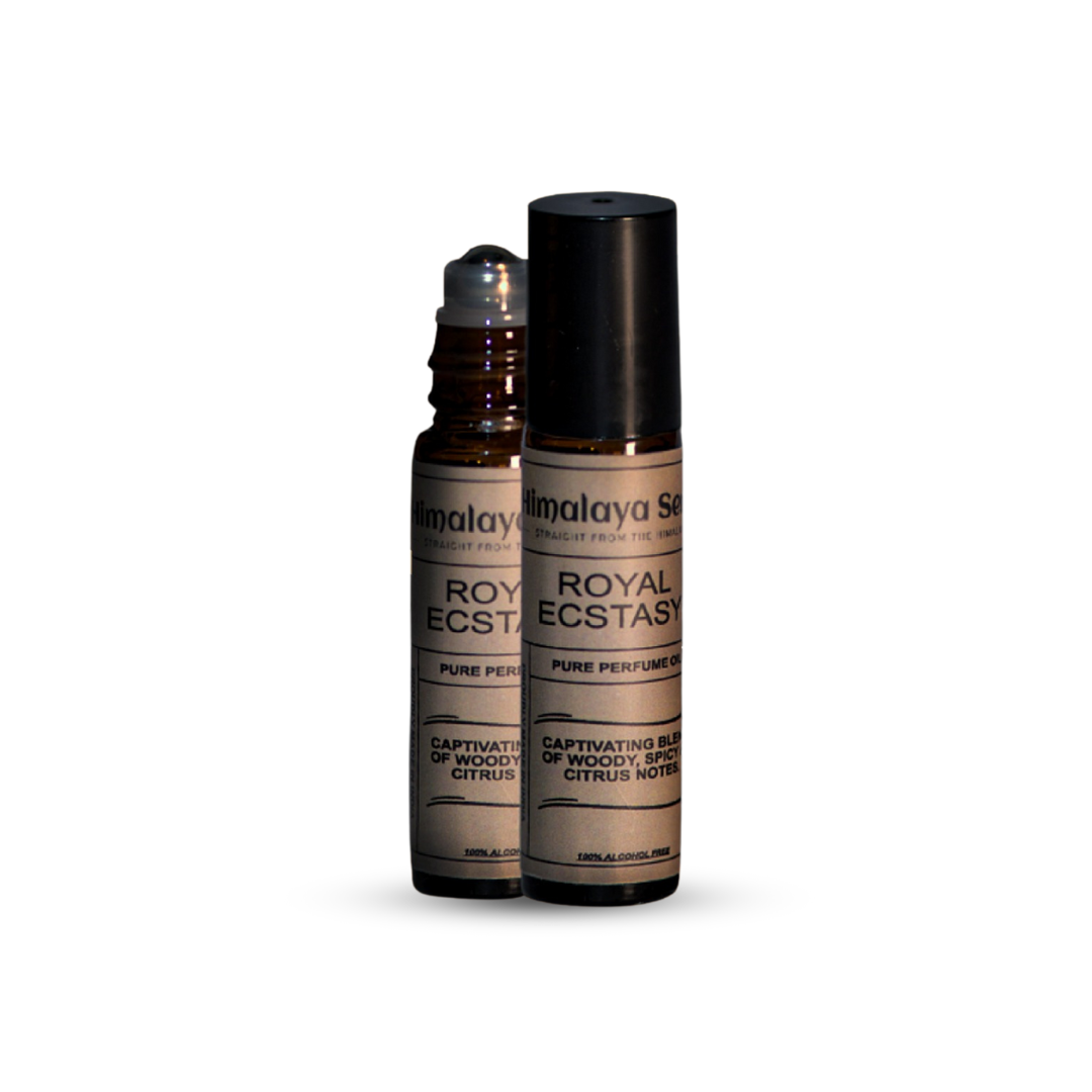 Two amber glass roll-on bottles of Himalaya Sensations Royal Ecstasy natural perfume oil for men, featuring a captivating blend of woody, spicy, and citrus notes.