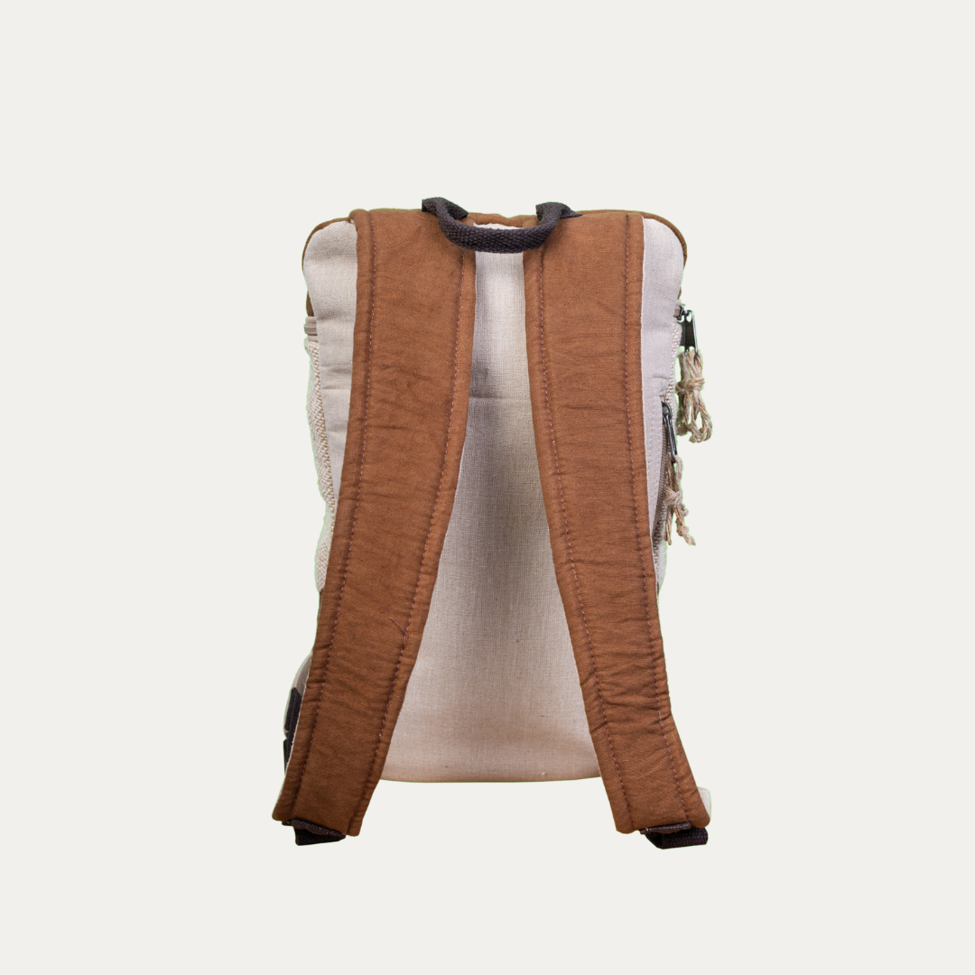 Handcrafted hemp backpack with brown cotton straps, back view. Features a spacious design with a pure cotton lining.