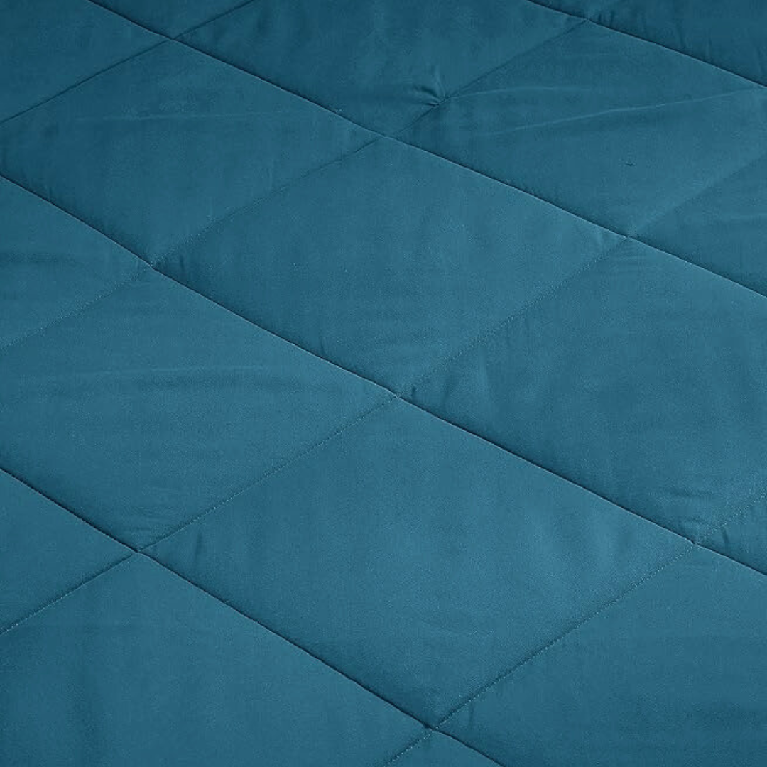 Teal Bellolin Microfibre Comforter with diamond stitching, offering a soft, comfortable and breathable night's sleep.