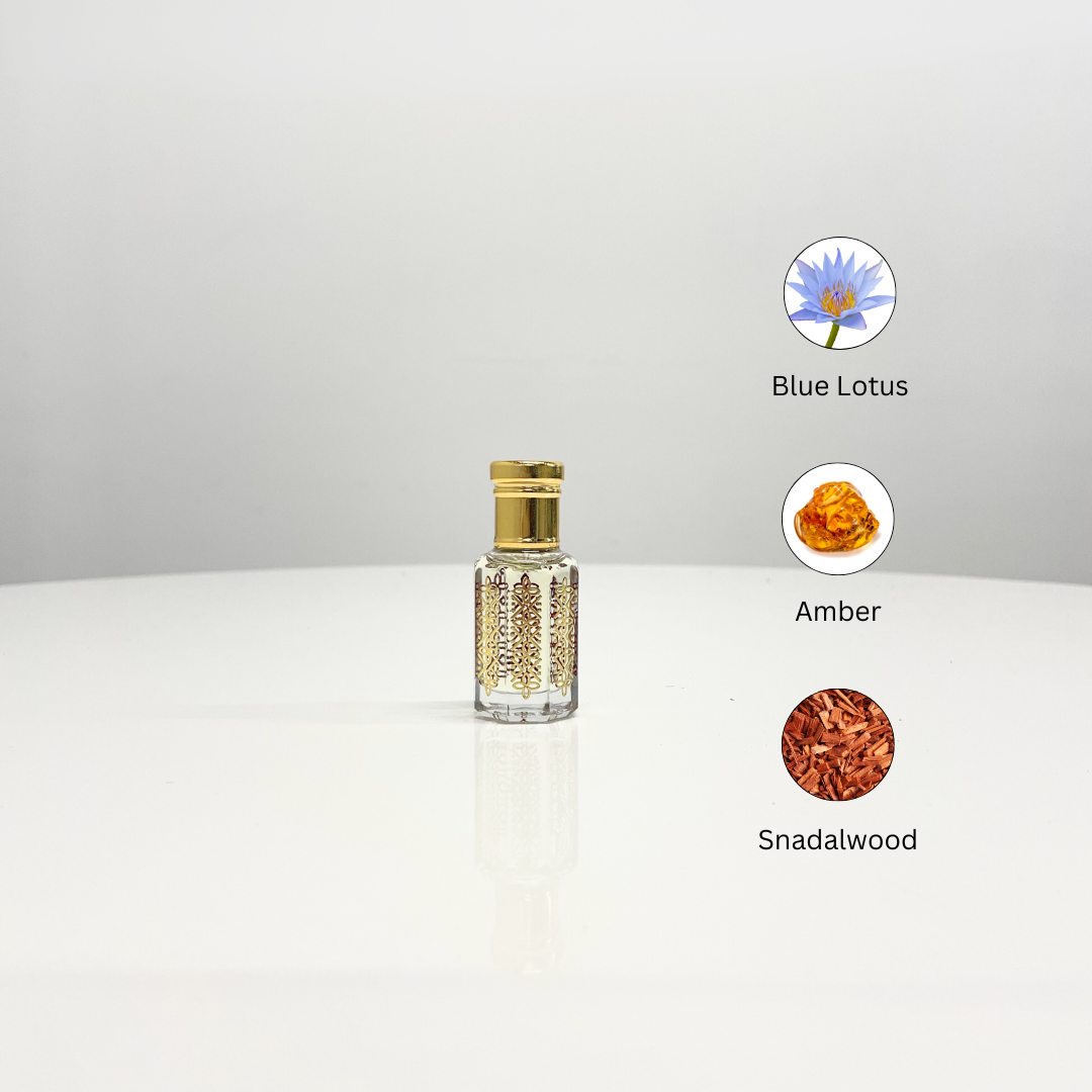 Blue Lotus Attar Unisex perfume in an ornate bottle with gold detailing. This unisex fragrance features notes of blue lotus, amber, and sandalwood.