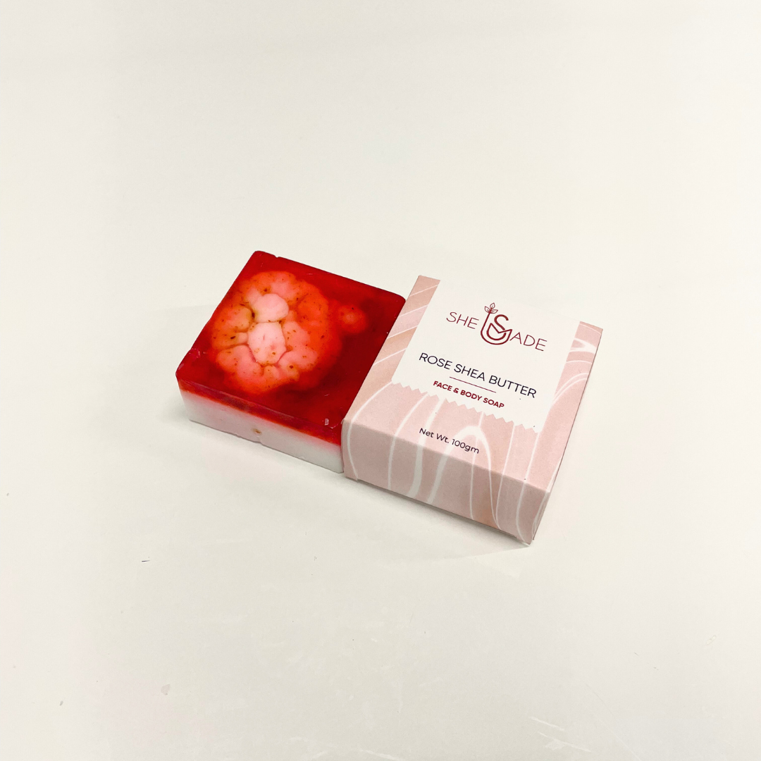 Handcrafted Rose & Shea Butter Soap in its packaging. This luxurious soap is perfect for both face and body.