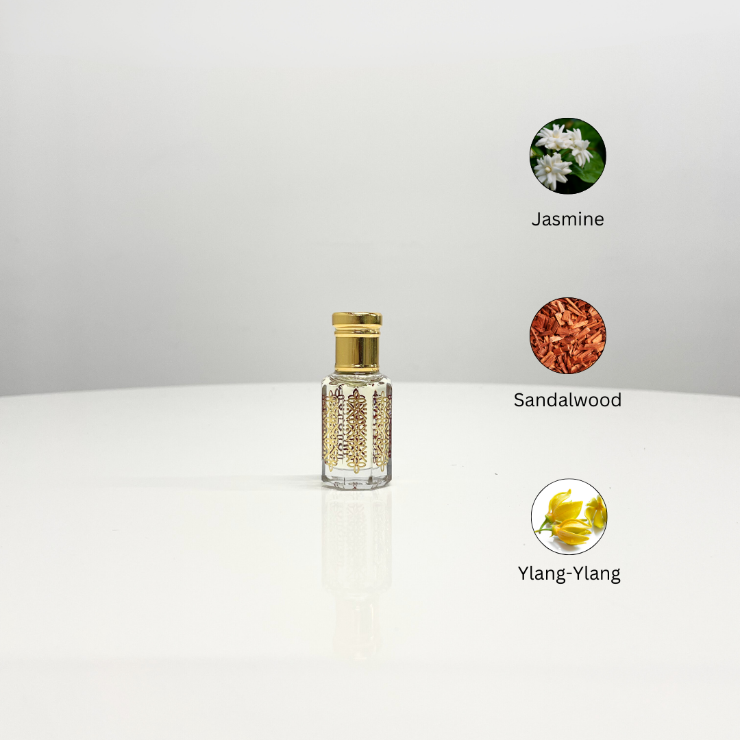 Ornate bottle of Jasmine Attar Unisex perfume with notes of jasmine, sandalwood, and ylang-ylang.