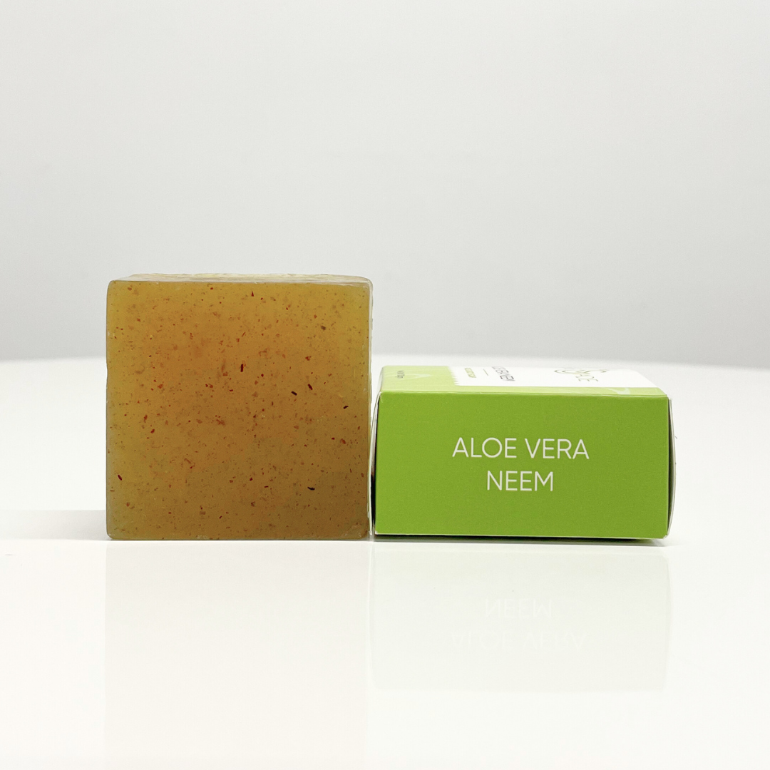 Handcrafted aloe vera and neem soap in its green packaging. This natural soap is nourishing, cleansing and rejuvenating.