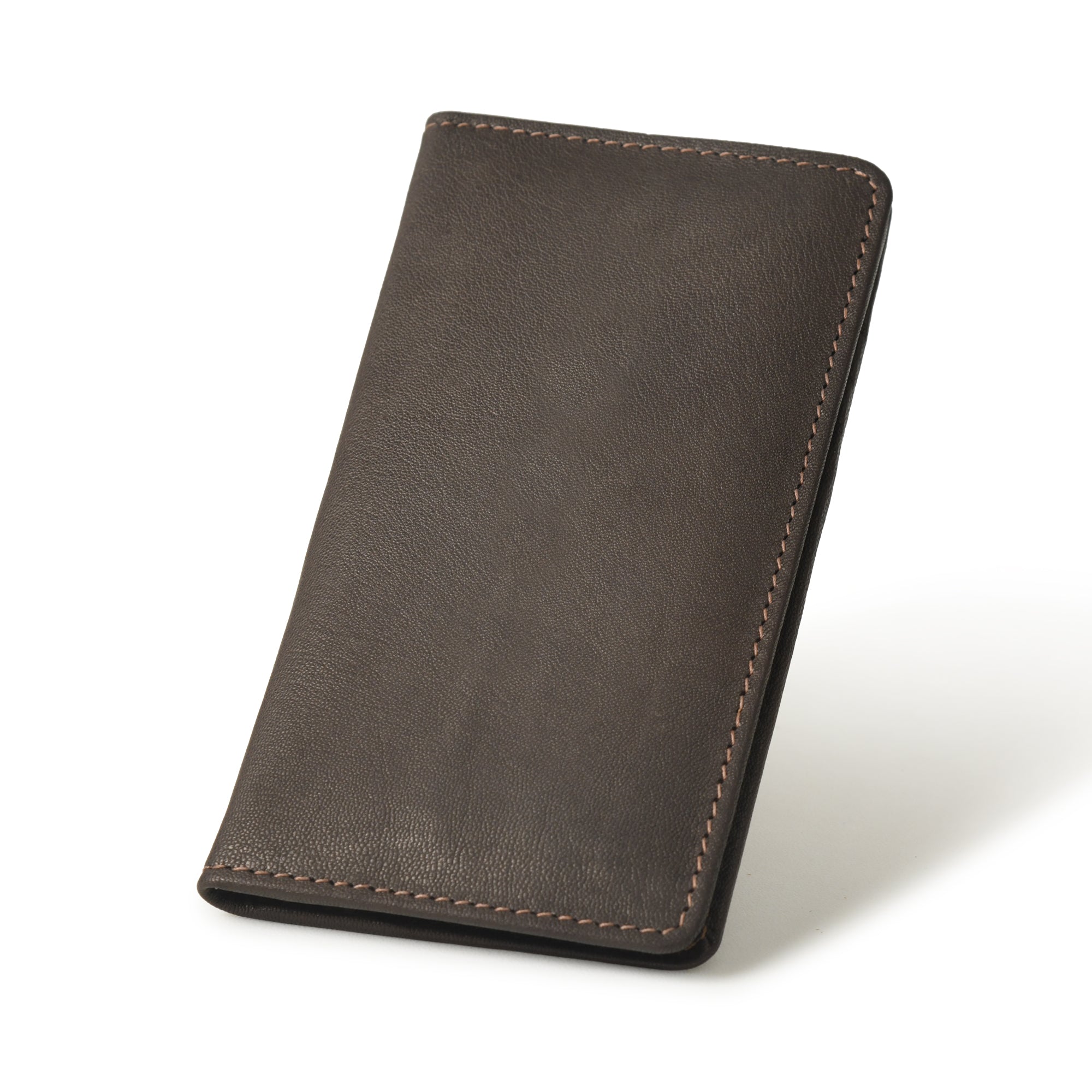 A brown leather men's bifold wallet stands upright, showcasing its slim profile and ample space for checkbooks, cards, and cash.