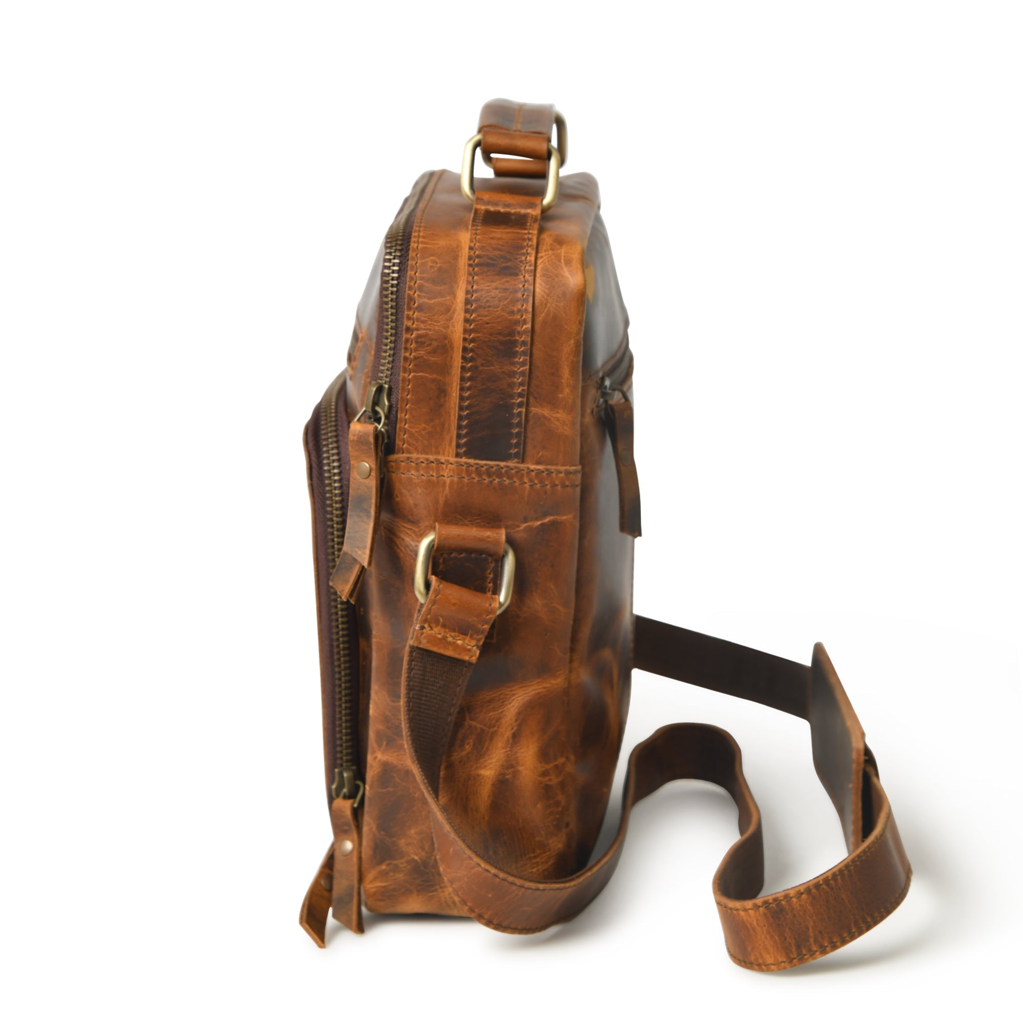 Stylish brown leather crossbody bag for men, featuring multiple zipper pockets and an adjustable strap.