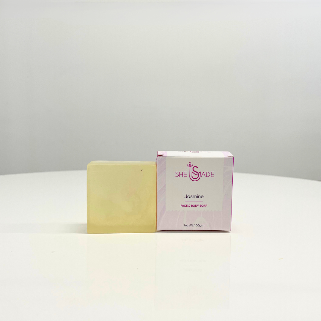 A bar of SheScade Jasmine handcrafted soap beside its box. This fragrant soap can be used on both face & body.