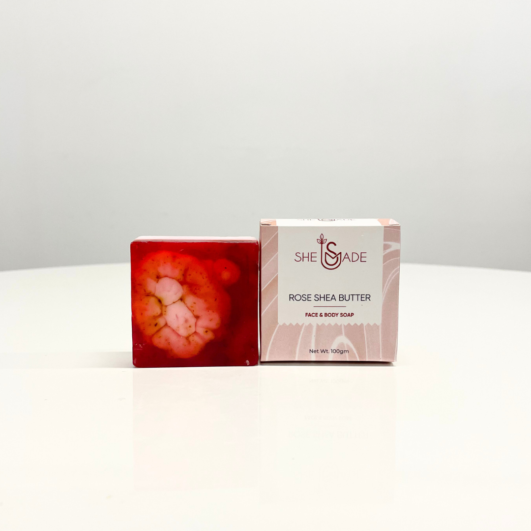 Handcrafted Rose & Shea Butter Soap in its packaging. This luxurious face & body soap is made with natural ingredients.