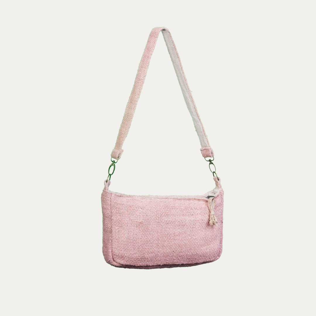 Pink sling hemp shoulder bag for women, shown on a white background.