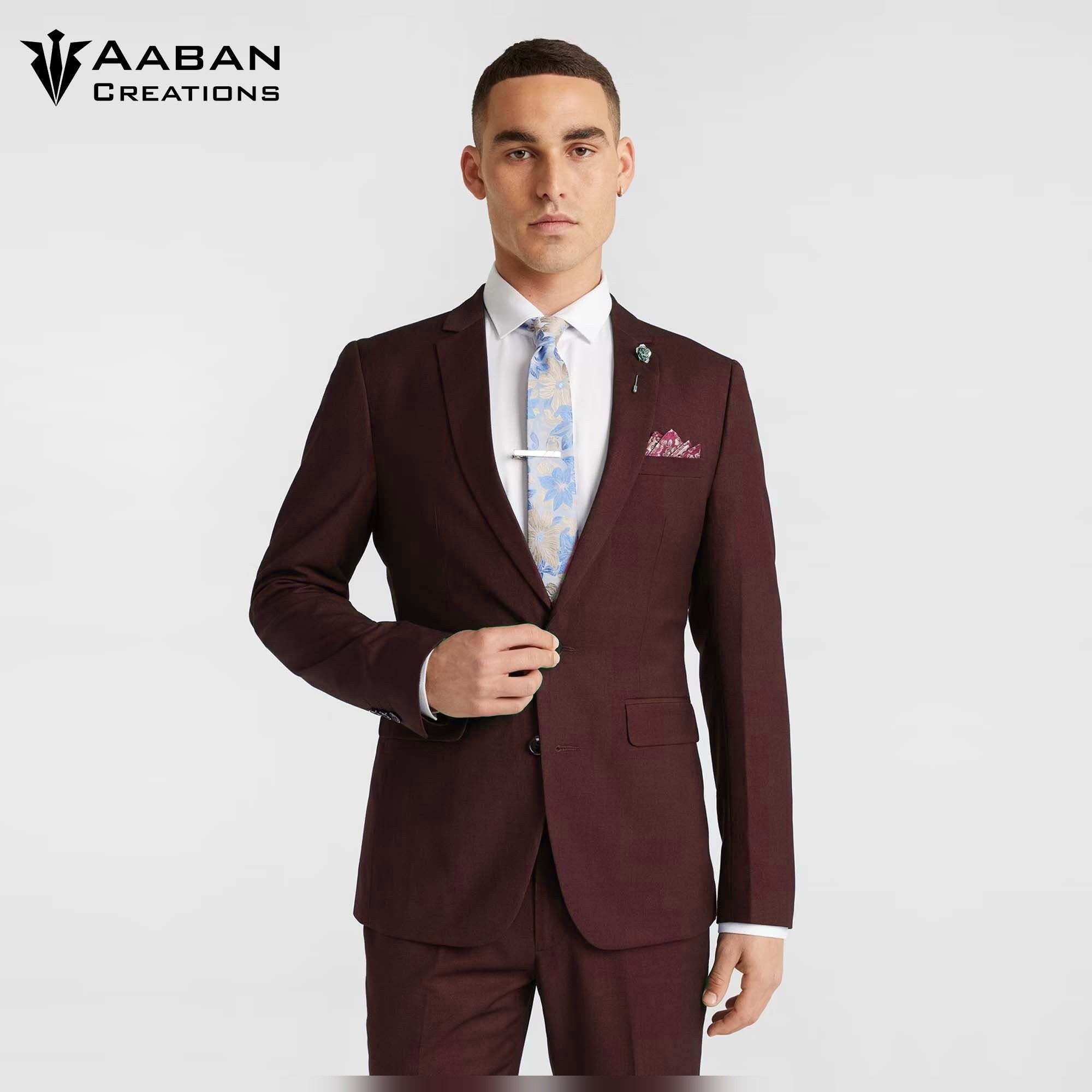 A model wears a slim-fit, crater brown two-piece men's business suit, perfect for formal events, meetings, or special occasions.