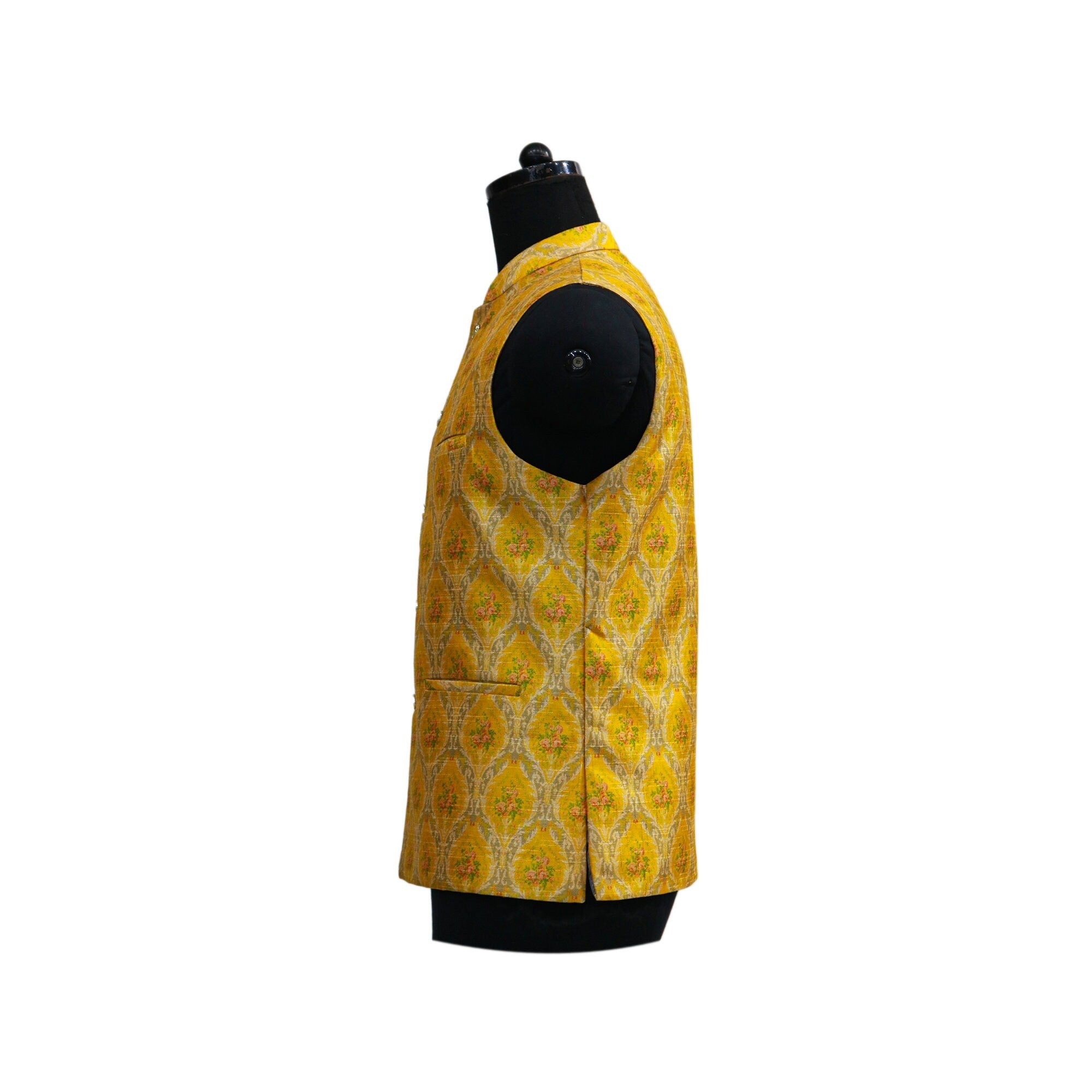 Yellow floral handmade vintage men's Nehru jacket, side view on mannequin. Indian ethnic party wear.