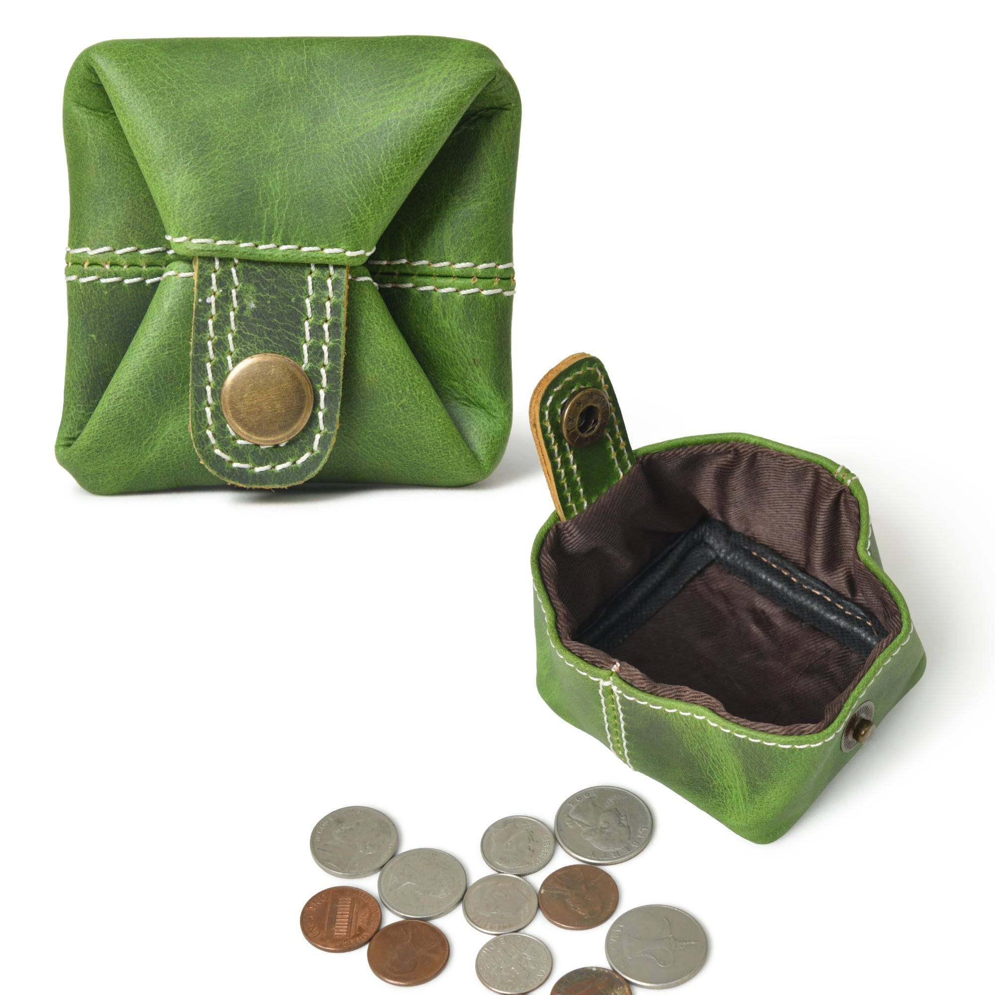 Slim green leather coin pouch, shown open and closed with coins scattered nearby.