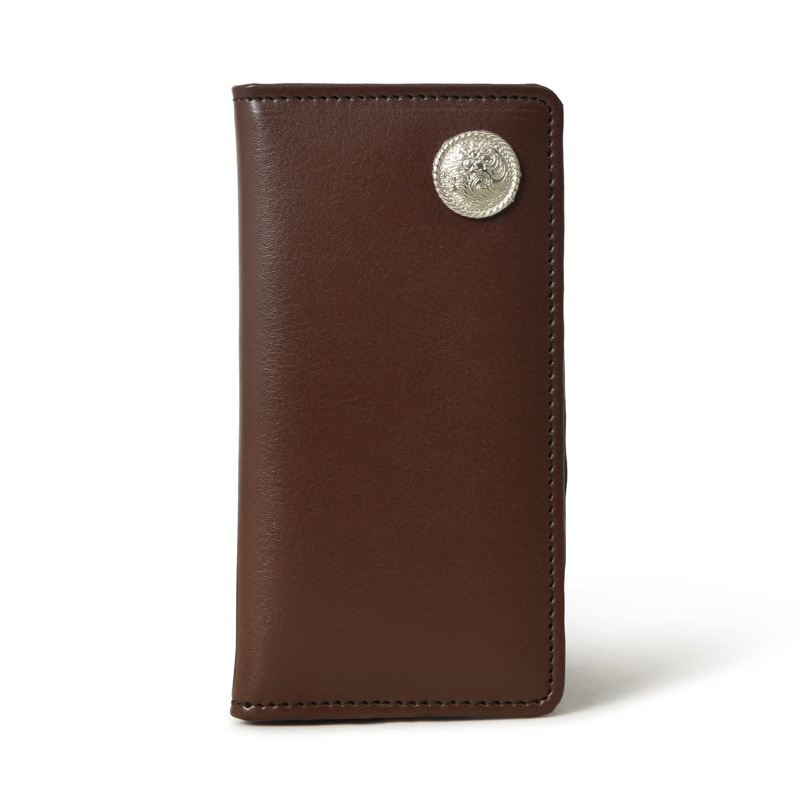 A sleek, brown leather checkbook cover stands closed, showcasing its slim profile and a silver-tone concho detail.