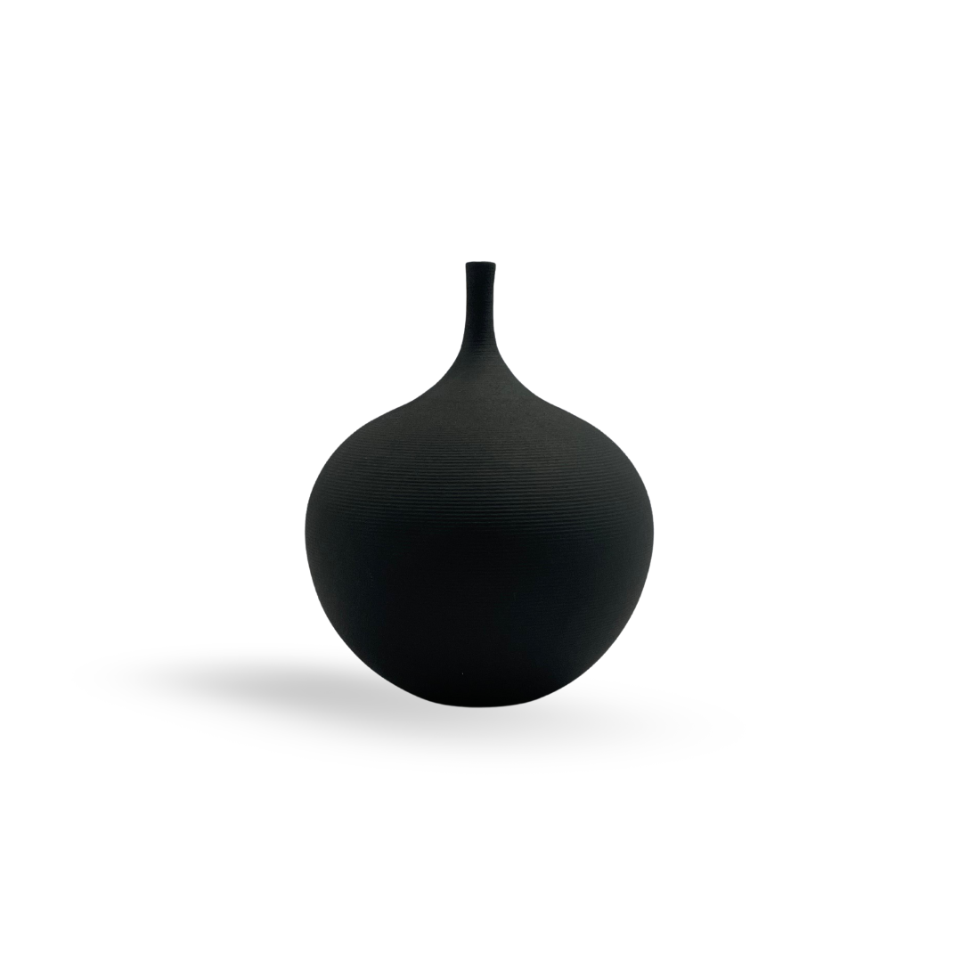 Rustic Charm Black Ceramic Horizon Vase. A round, black ceramic vase with a textured surface and a narrow neck.