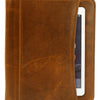 Brown leather padfolio closed, showcasing the premium leather and exterior tablet pocket.