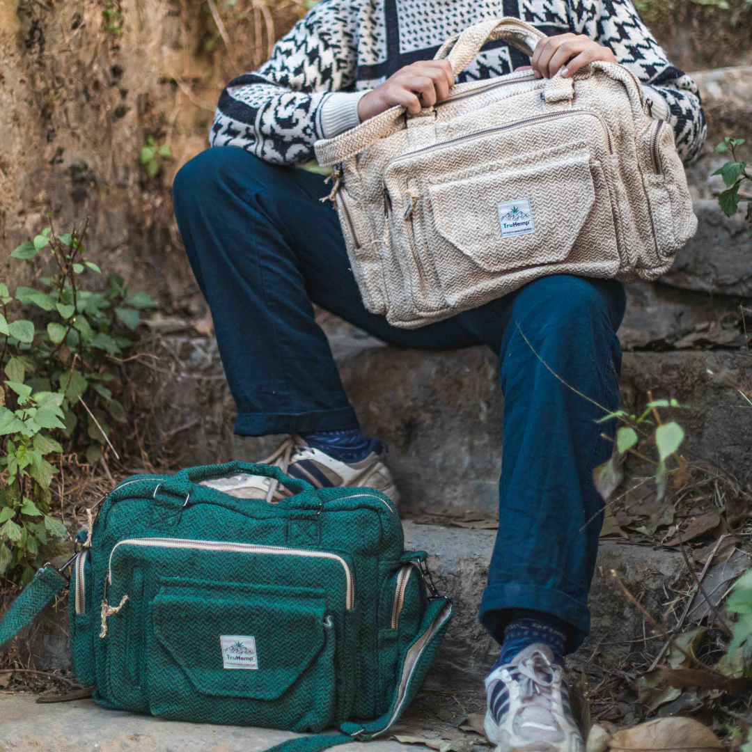 Stylish Himalayan Hemp Laptop Side Bag with adjustable strap, perfect for carrying your tech essentials. Available in natural and green.