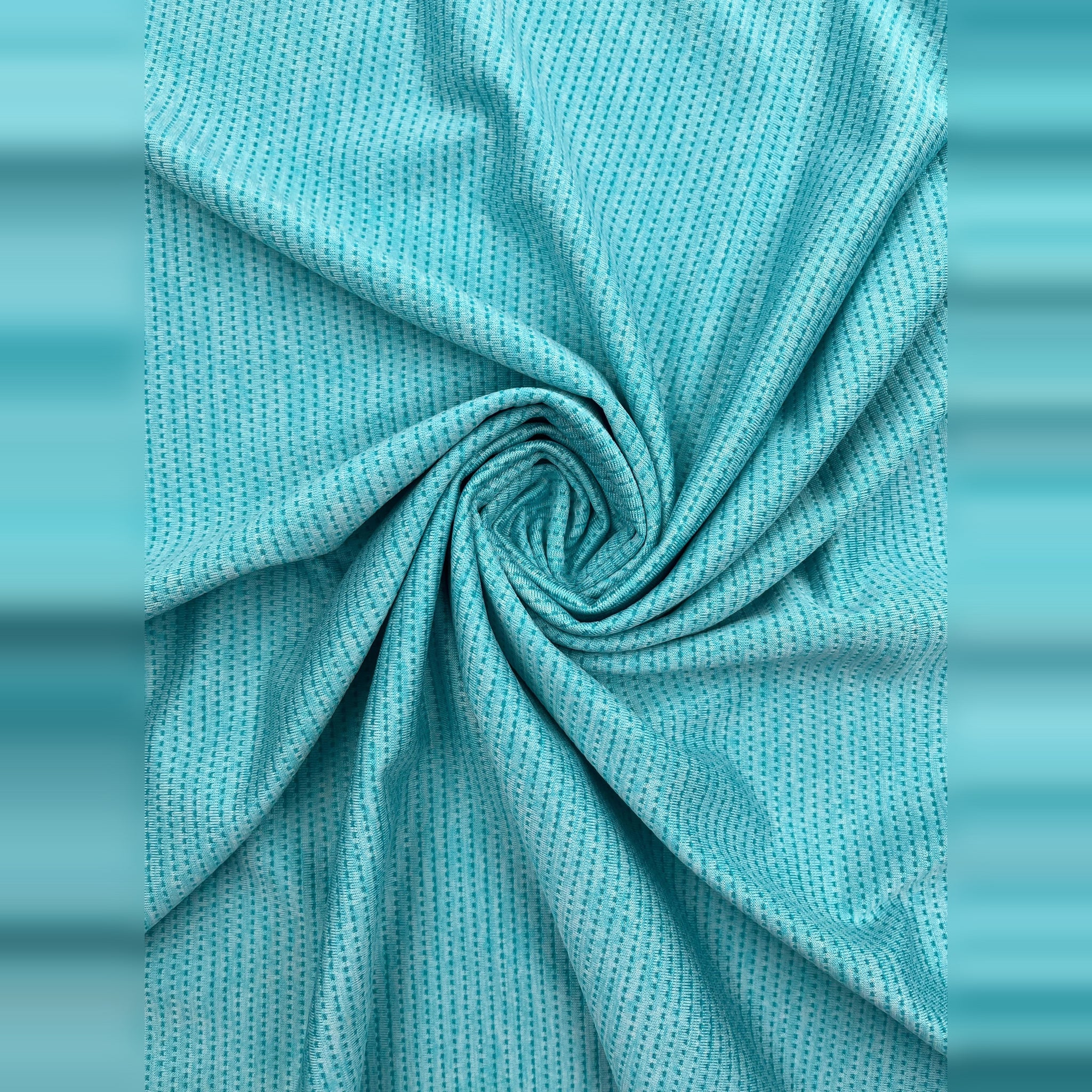 Teal blue fabric swatch of Men's Casual Slim Fit Short Sleeve T-Shirt with textured weave.