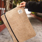 Eco-friendly Himalayan Natural Hemp Laptop Sleeve with a unique herringbone pattern and a secure zipper closure.