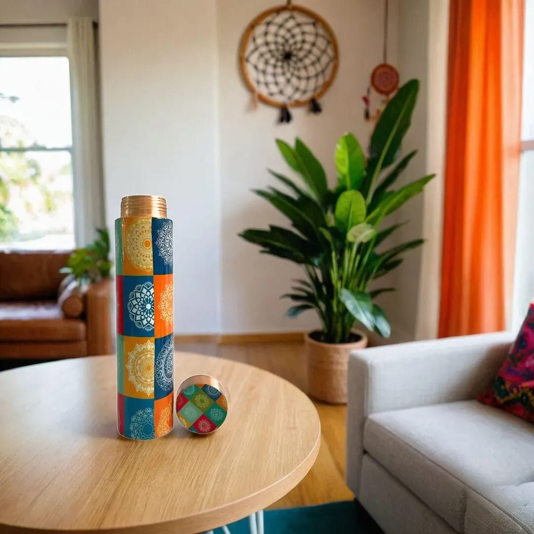 Multicolor copper water bottle with a bohemian mandala pattern, shown with its matching lid.